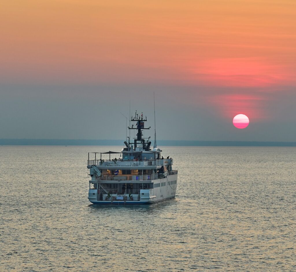 Image of the Paspaley Pearl for Pearl Expeditions in the sunset.