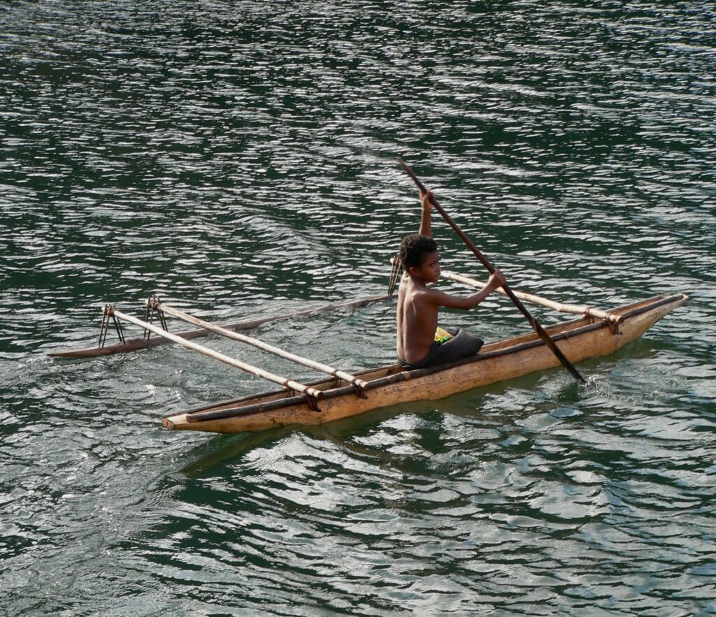 On a boat in Tufi, Papua New Guinea, a place visited by the Pasapaley Pearl