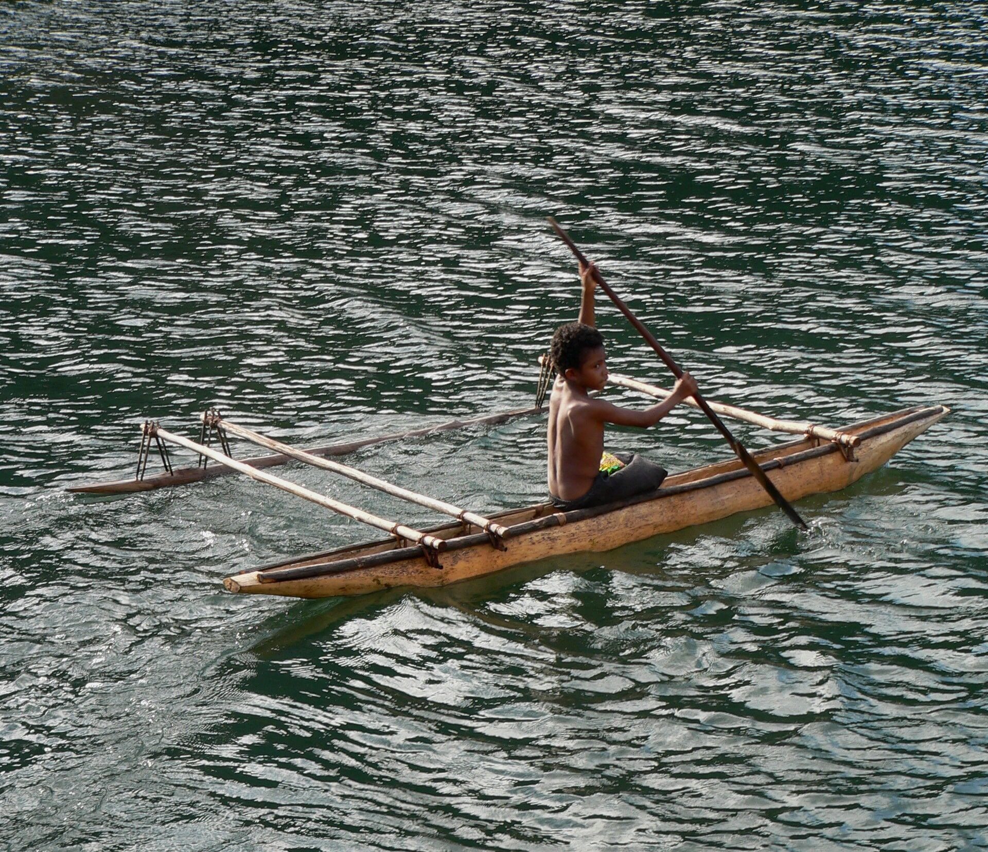 On a boat in Tufi, Papua New Guinea, a place visited by the Pasapaley Pearl
